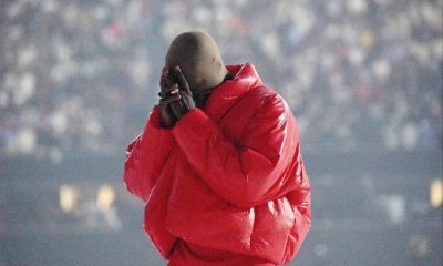 Kanye West portait un masque en bas de laine alors qu'elle pleurait son divorce lors du lancement de son album excentrique Crédit : Getty